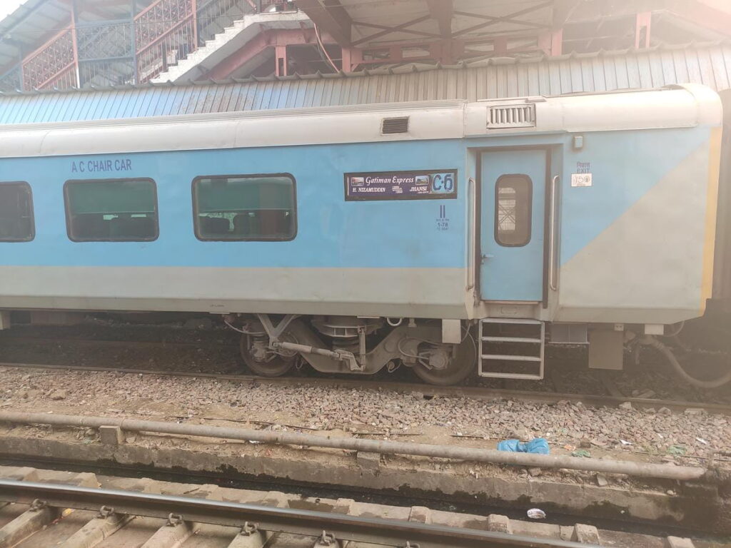 Gatimaan Express AC chair car coach at railway station platform in India