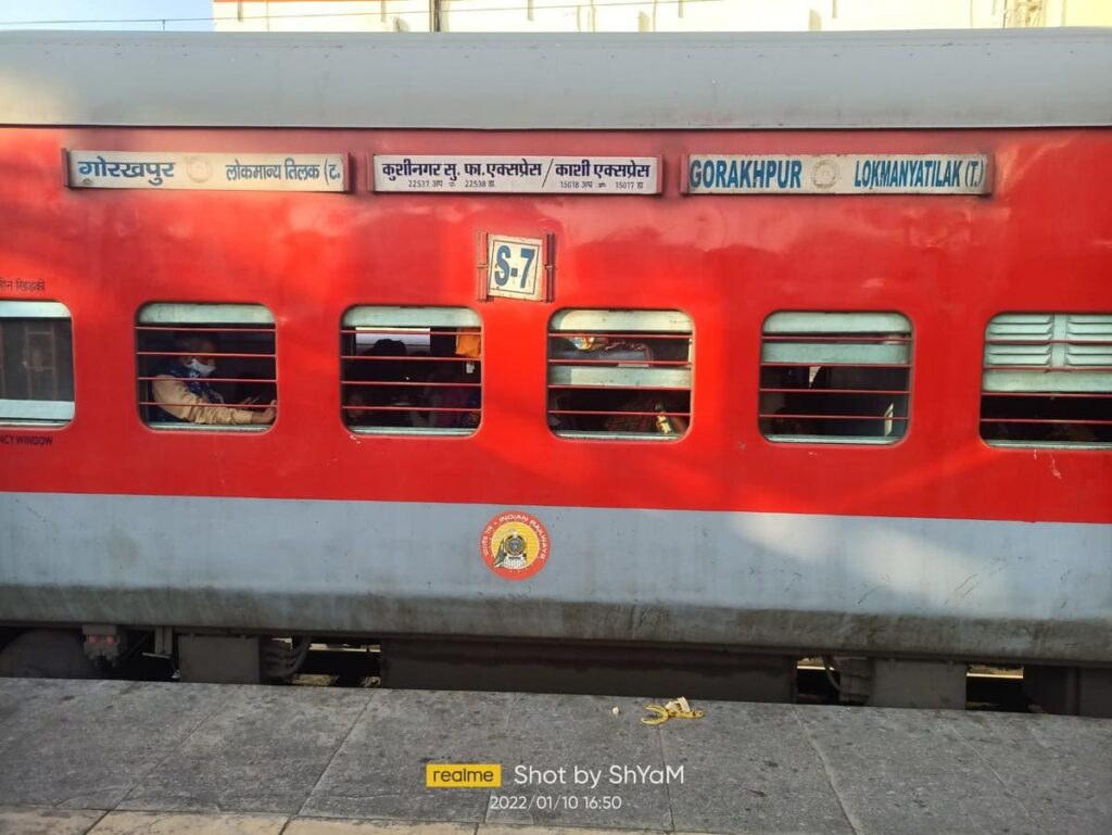 Gorakhpur to Lokmanya Tilak Terminus Express sleeper coach with route board and passengers inside
