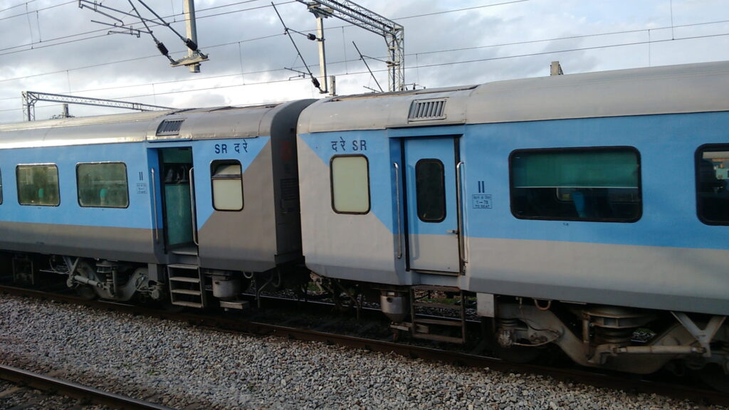 Indian Railways LHB passenger coaches connected on electrified track