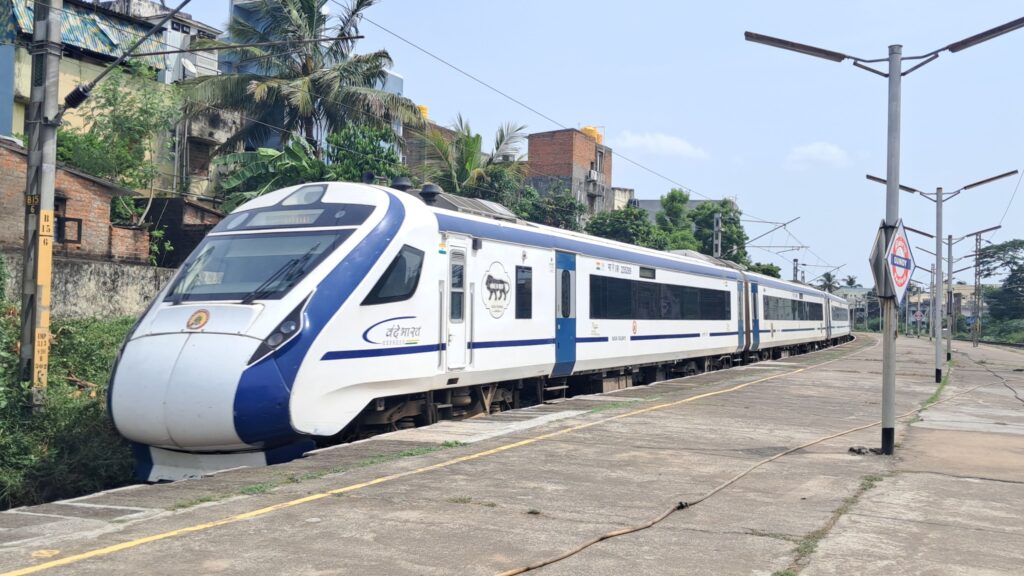 Vande Bharat Express train standing at a railway station showcasing India’s modern semi high speed train technology